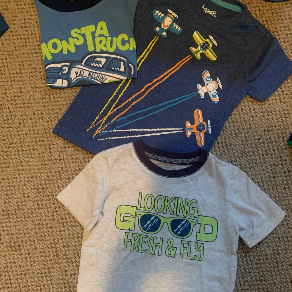 Three articles of clothing. 3T boys tops. Lightly used. Well taken care of.